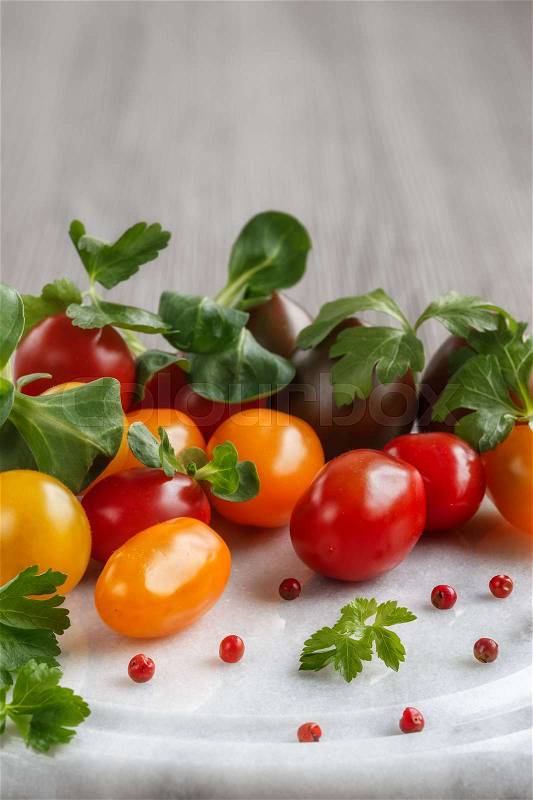 Cherry tomatoes and Peruvian pepper, stock photo