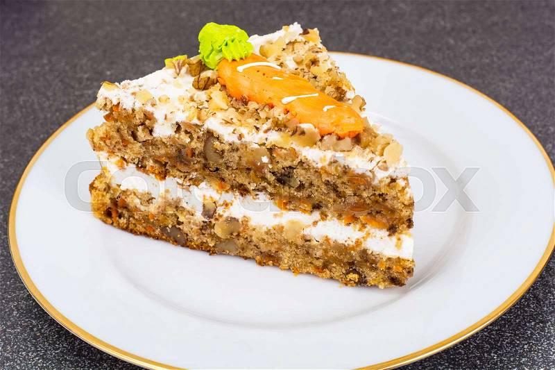Slice of carrot biscuit cake. Studio Photo, stock photo