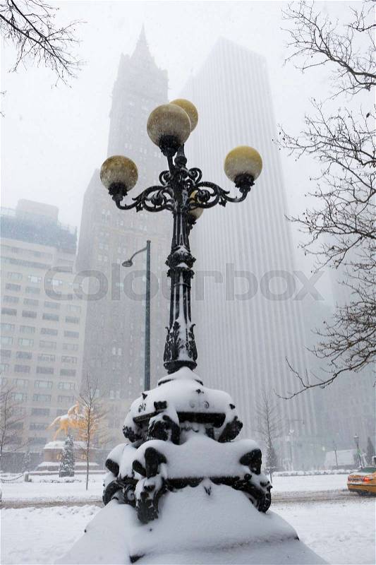 NEW YORK CITY - Feb 9: Grand Army Plaza in New York on February; 2017. Grand Army Plaza lies at the intersection of Central Park South and Fifth Avenue in front of the Plaza Hotel in Manhattan., stock photo