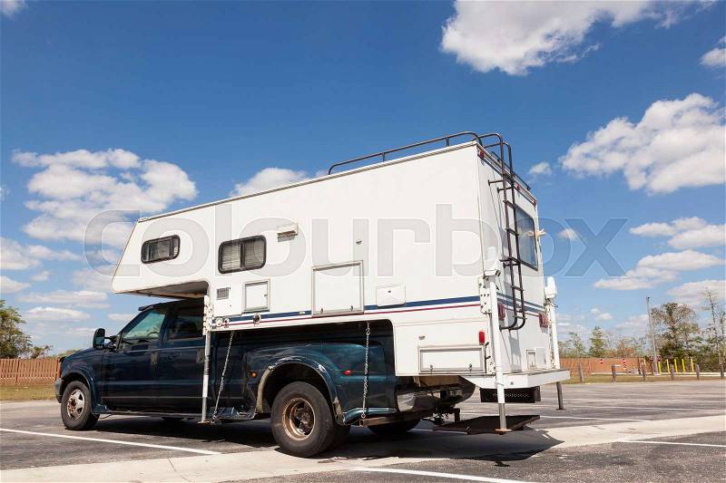 Older recreational vehicle at the parking lot in Everglades National Park. Florida, United States, stock photo