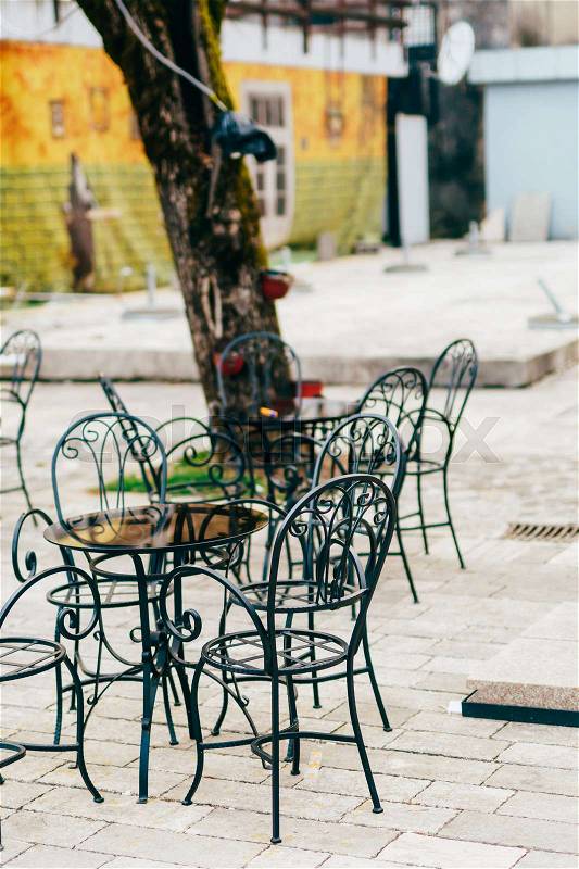 Tables in cafe on the street. Street Cafe. Restaurants in Montenegro, stock photo
