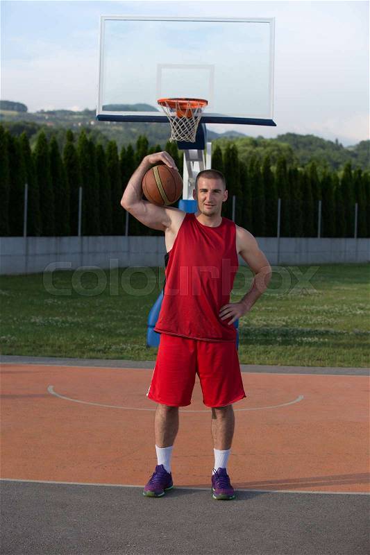 Portrait of young man street basket player, stock photo