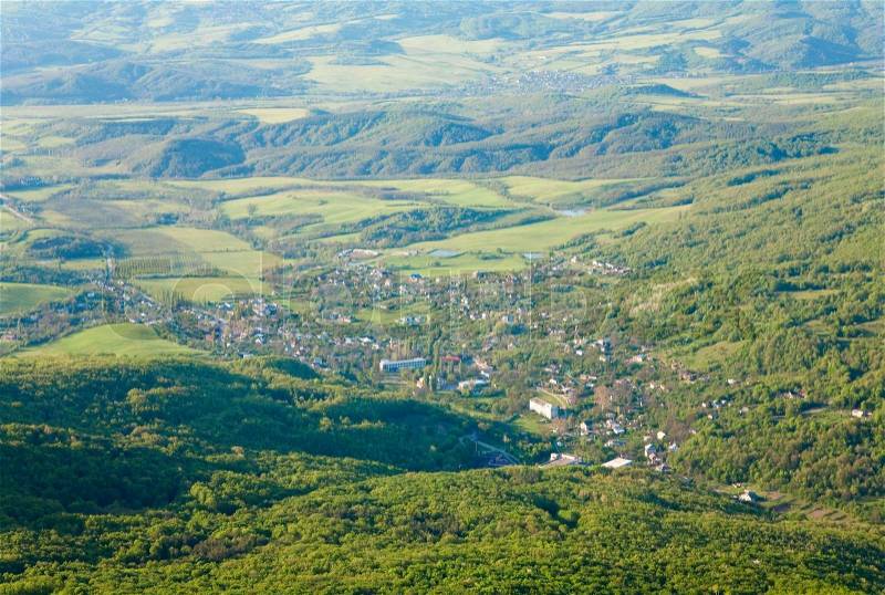 Spring Crimea Mountain country landscape with valley and Sokolinoje Village(Ukraine), stock photo