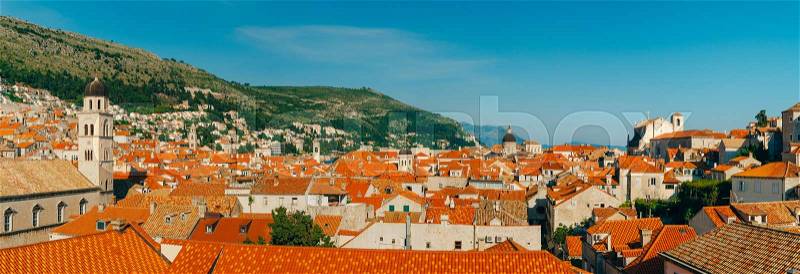 Dubrovnik Old Town, Croatia. Tiled roofs of houses. Church in the city. City View from the wall, stock photo