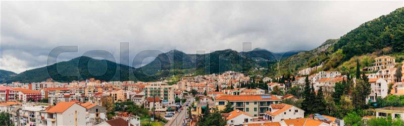 New homes in Budva, Montenegro. New town. Real estate on the shores of the Adriatic Sea. House with orange roof tiles, stock photo