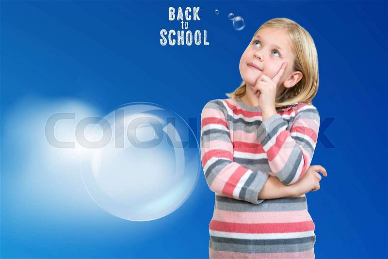 Little daydreamer. Cheerful little girl holding finger on chin and looking away while standing isolated on white, stock photo