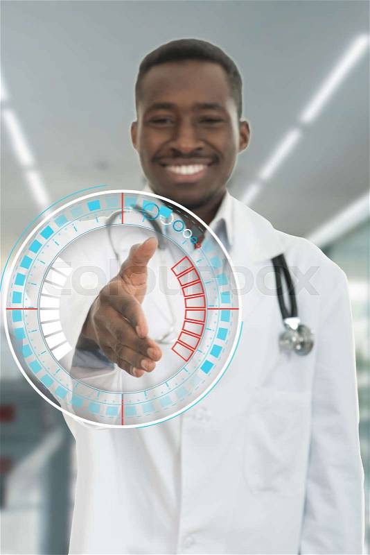 Closeup portrait smiling black healthcare professional, male doctor with stethoscope, giving handshake, stock photo