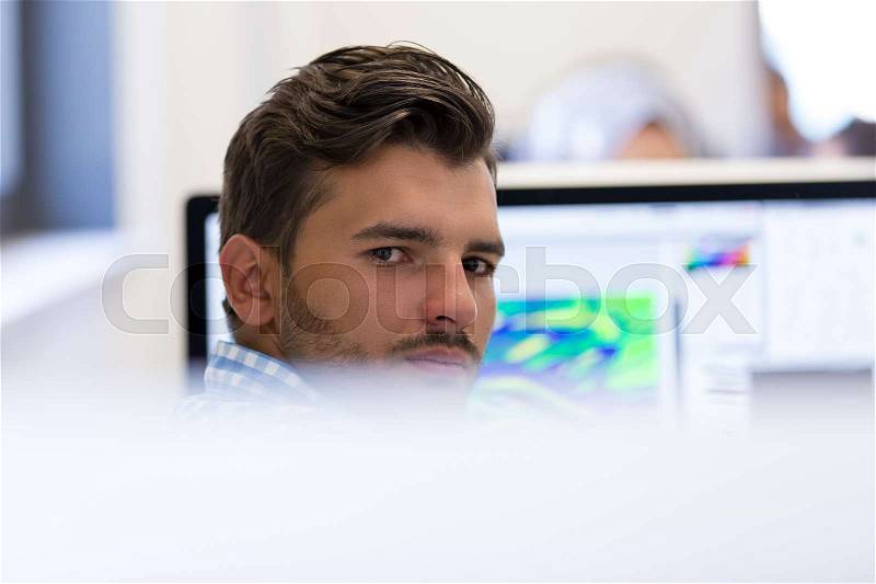 Startup business, software developer working on desktop computer at modern office, stock photo