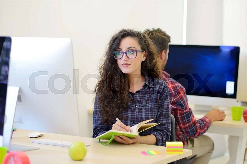 Startup business, software developer working on computer at modern office, stock photo