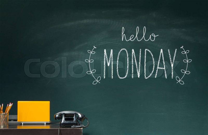 Hello Monday! words writing on chalkboard, stock photo