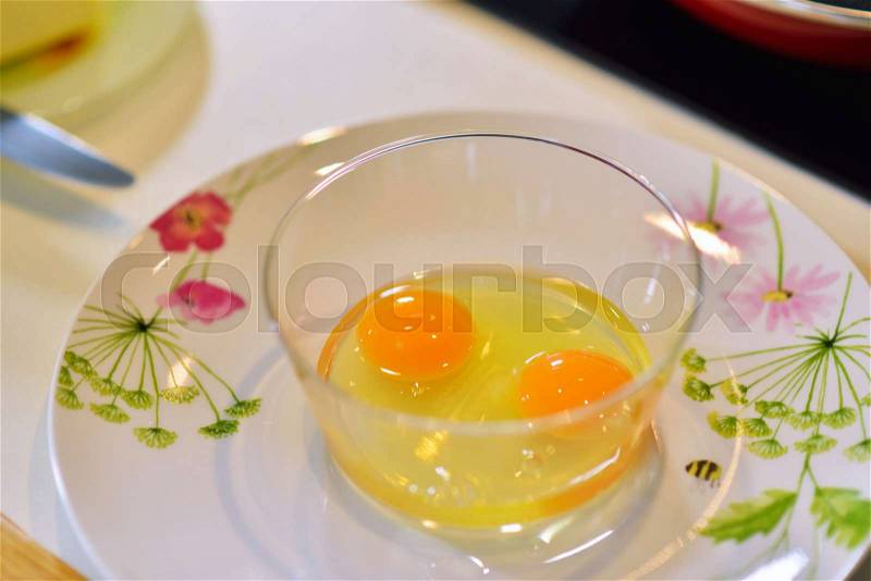 Kitchen table with eggs on basket, focus from top view kitchen table, stock photo