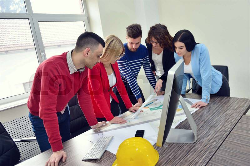 Young team have a Meeting In Architects Office, stock photo