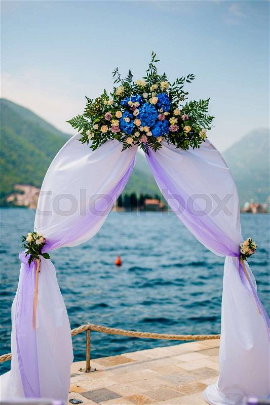Arch for the wedding ceremony on the sea, stock photo