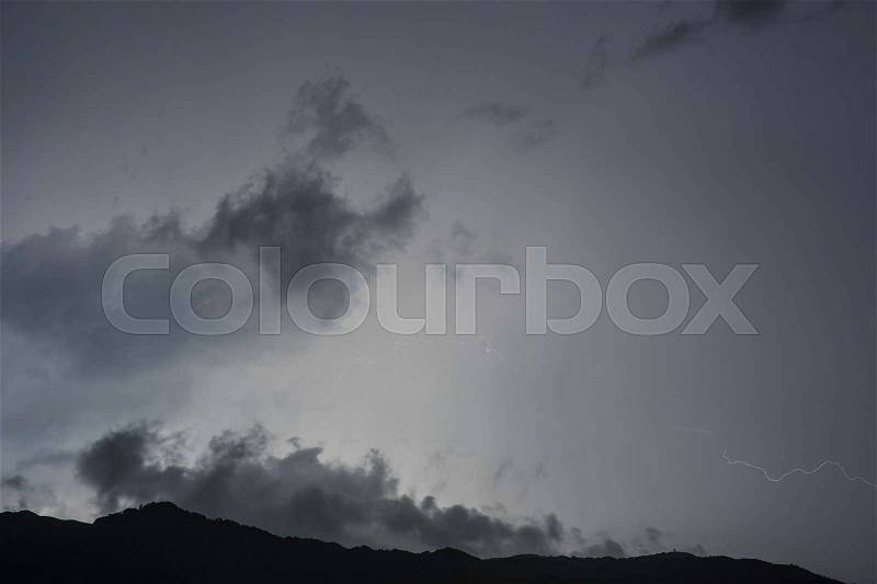 Lightning in the night sky. Mountains in Montenegro, stock photo
