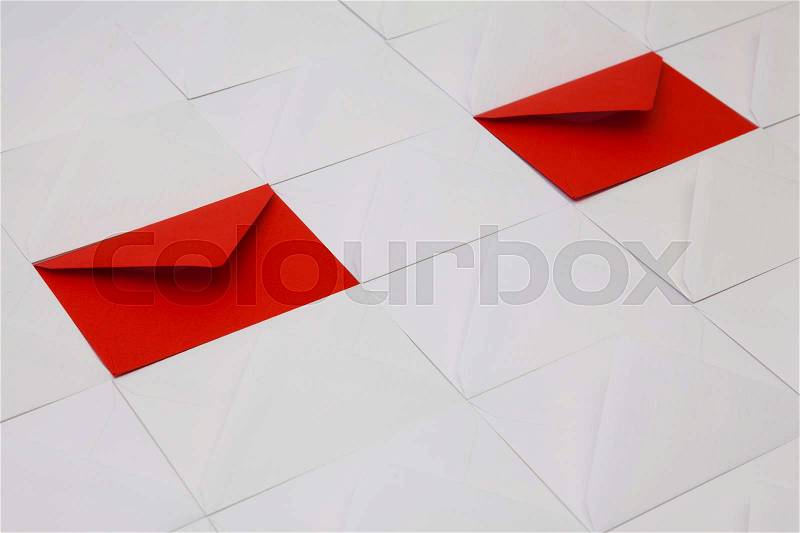 Composition with white and red envelopes on the table, stock photo