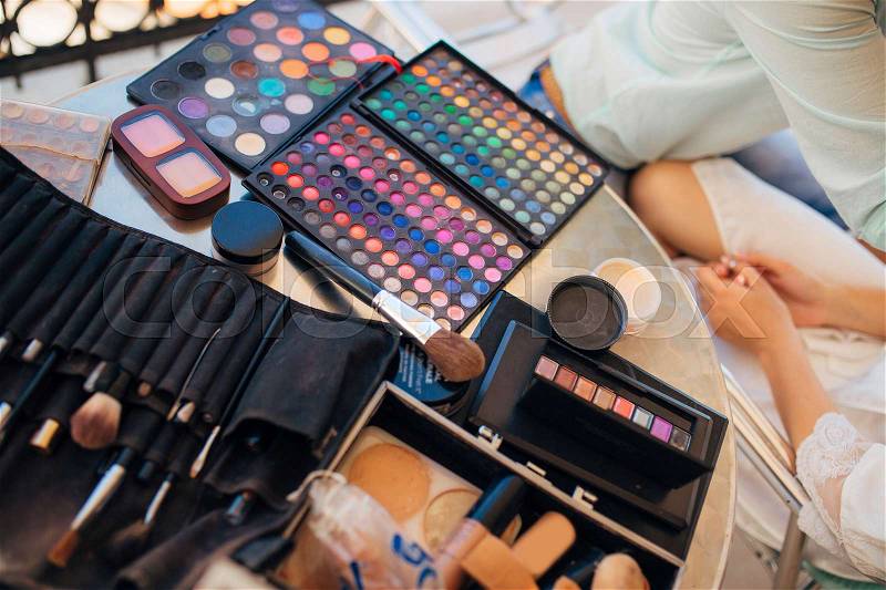 Case makeup artist. A set of brushes, powder, foundation. Tools make-up artist in a box, stock photo
