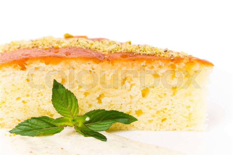Sweet lemon pie with grated nuts and pistachio mousse. Macro. Photo can be used as a whole background, stock photo