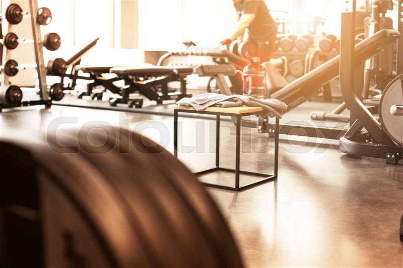 The abstract blur fitness gym background at sunny day, stock photo