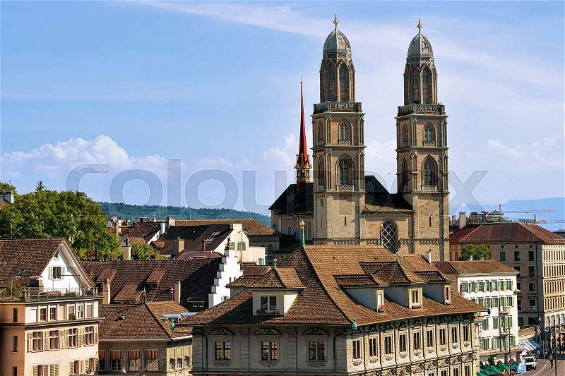 Double towers of Grossmunster Church in Zurich, Switzerland. View from Lindenhof hill, stock photo