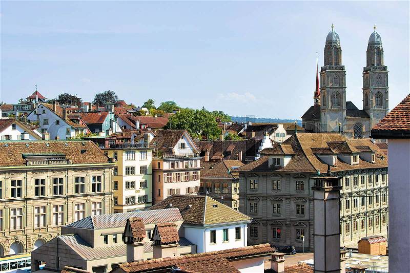 Double towers of Grossmunster Church in Zurich, in Switzerland. View from Lindenhof hill, stock photo