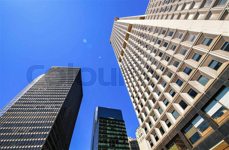 Bottom up view of glass skyscrapers in New York of USA, stock photo