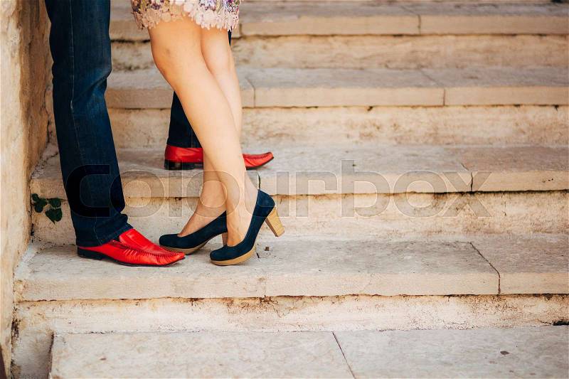 Male and female couples in love feet in Montenegro, stock photo