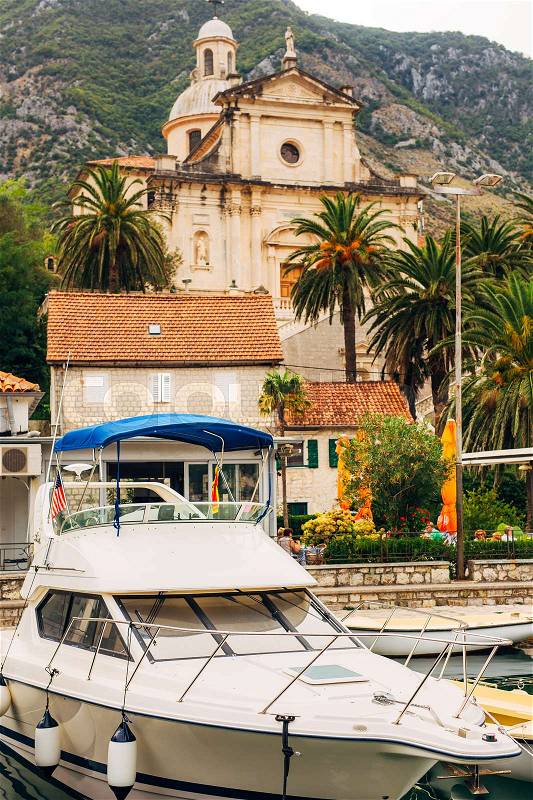 The territory of the Church of the Nativity of the Virgin in Prcanj, Montenegro, in the Boka Bay of Kotor, stock photo