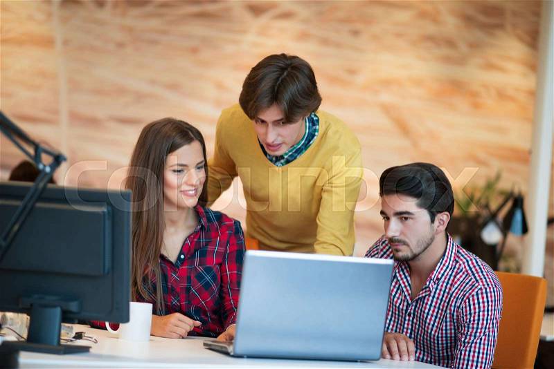 Startup business people group working as team to find solution to problem, stock photo