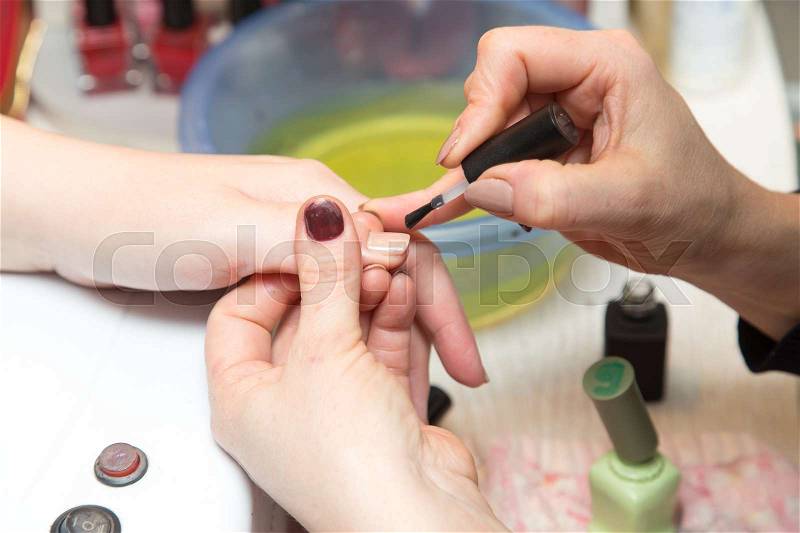 Manicure in a beauty salon . A photo, stock photo