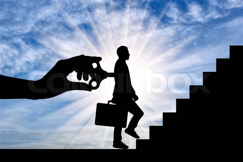 Key in boss\'s hand, turns working man at steps. Concept of work, stock photo