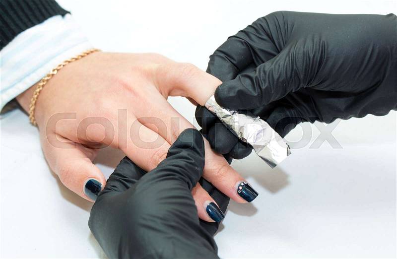 Woman doing manicure beauty salonWoman doing manicure beauty salon, stock photo
