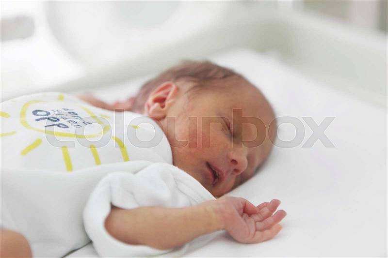 Newborn baby in hospital, stock photo