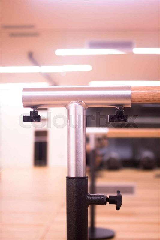Pilates exercise training and flexibility stretching bar equipment in gym yoga and wellbeing studio, stock photo