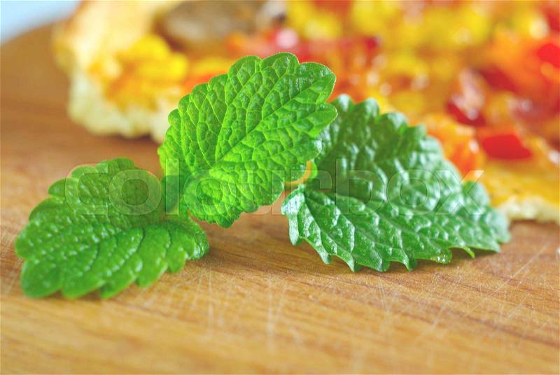 Mint green leaves with food background. Green natural peppermint leaf food ingredients. Spice herbal eating, stock photo