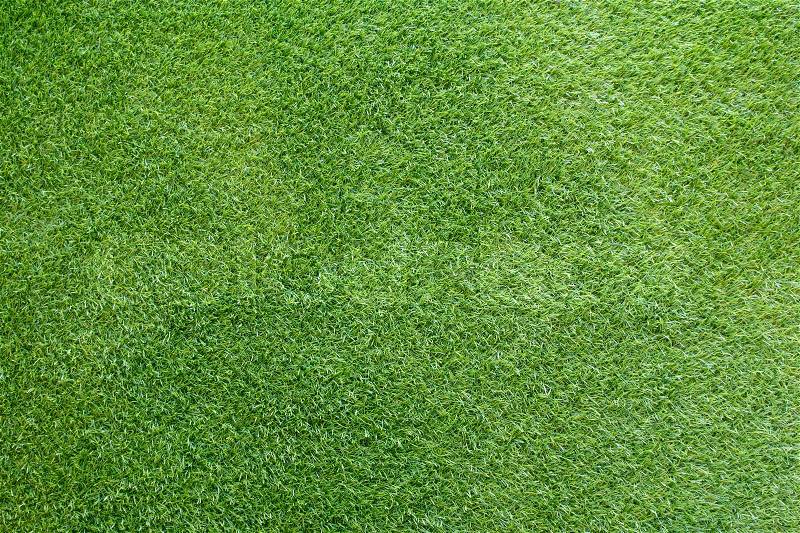 Green grass artificial background, stock photo