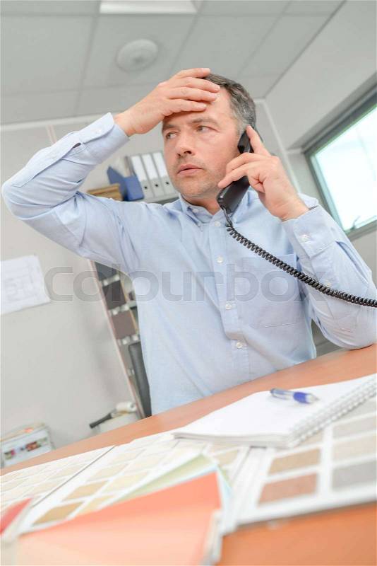 Panicked office worker, stock photo