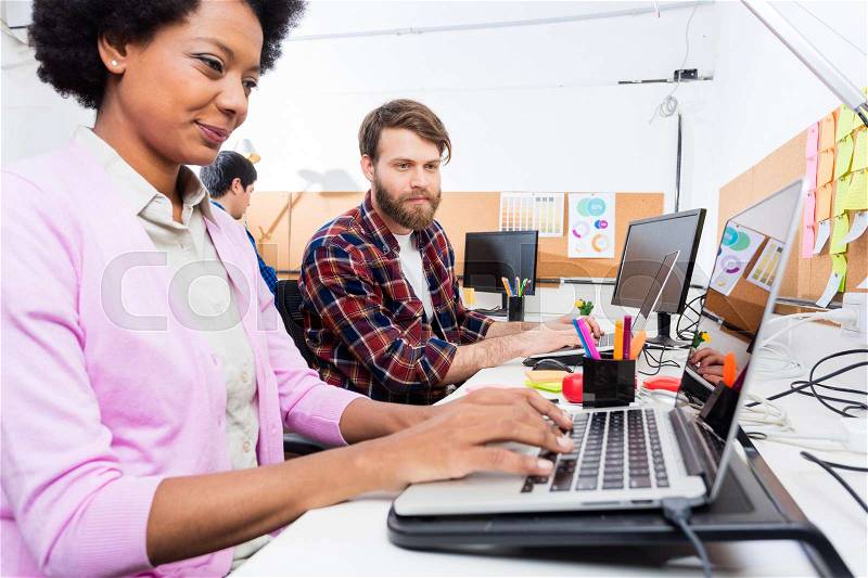 People office diverse mix race group businesspeople working woman point finger laptop casual wear, stock photo