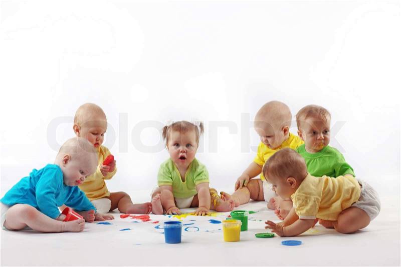 Group of babies painting on white background, stock photo