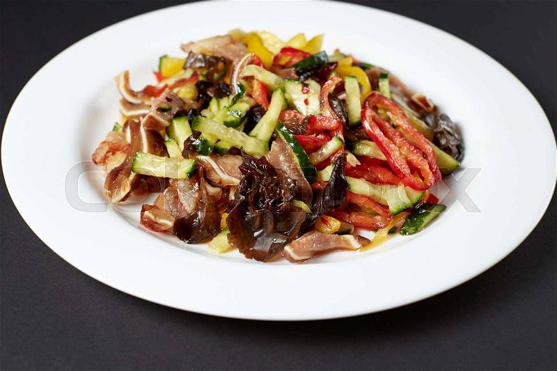 Salad Pig Ears. Asian food. Asian cuisine. Studio shot on dark or black background, stock photo