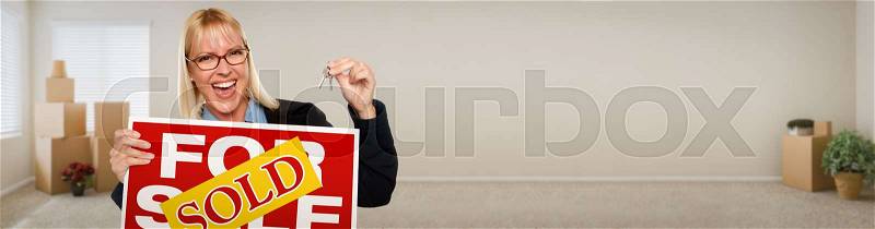 Banner of Adult Woman Inside Room with Boxes Holding House Keys and Sold For Sale Real Estate Sign, stock photo