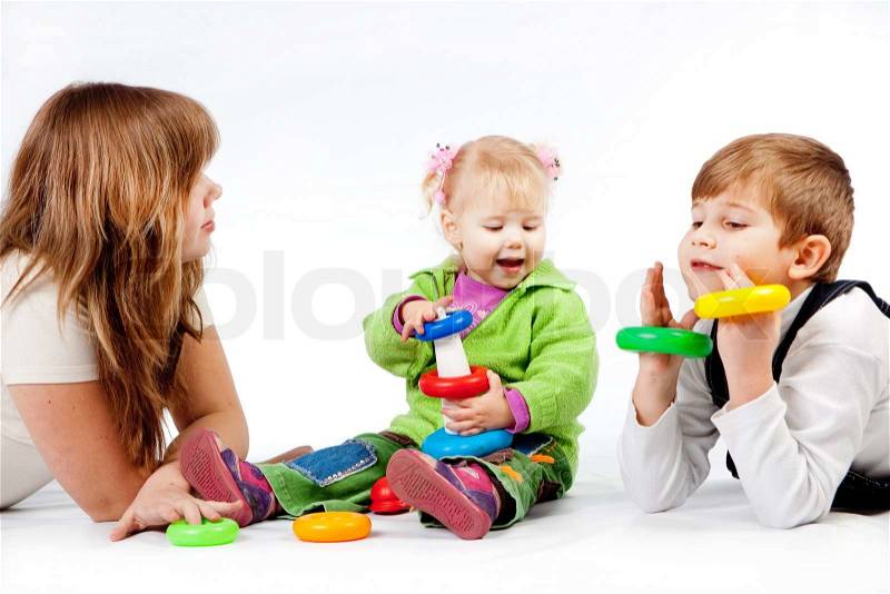 Playing happy children of mixed age on white, stock photo