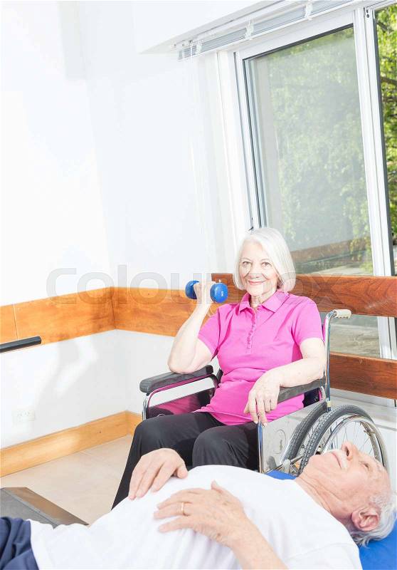 Rehab exercises for elderly people, stock photo