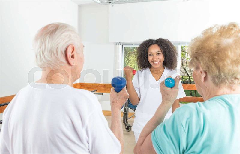 Rehab exercises for elderly people, stock photo