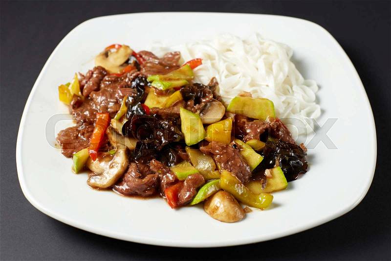 Beef Thai. Asian food. Asian cuisine. Studio shot on dark or black background, stock photo