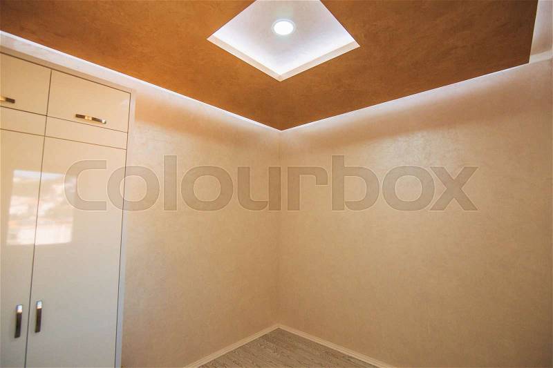 An empty apartment with no furniture. The apartment is renovated. Apartment for rent, stock photo
