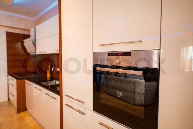 The oven in the kitchen. Stove with oven. The kitchen in the apartment, stock photo