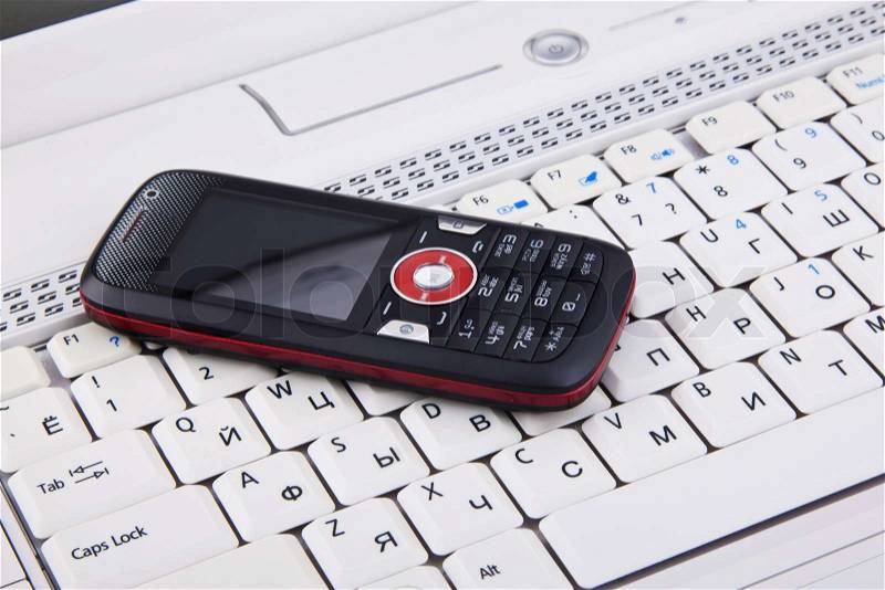 Keyboard and mobile phone background, stock photo