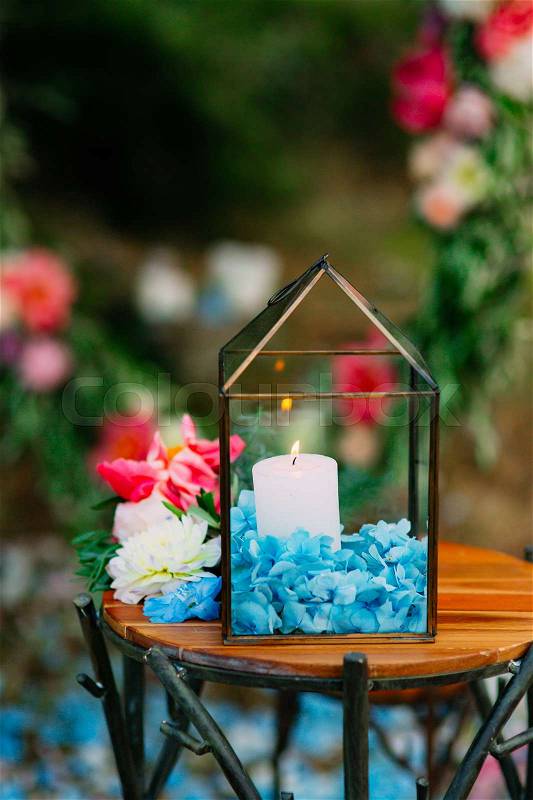 Candles in glass lamps. Wedding decorations. Wedding in Montenegro, stock photo