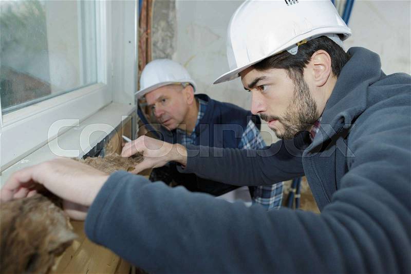 Windows installation workers, stock photo