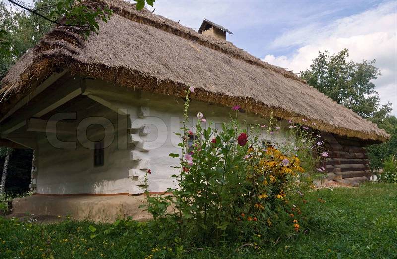 Small Ukrainian historical house (preceding century, museum of Ukrainian folk architecture in Pirogovo village (near Kiev)), stock photo